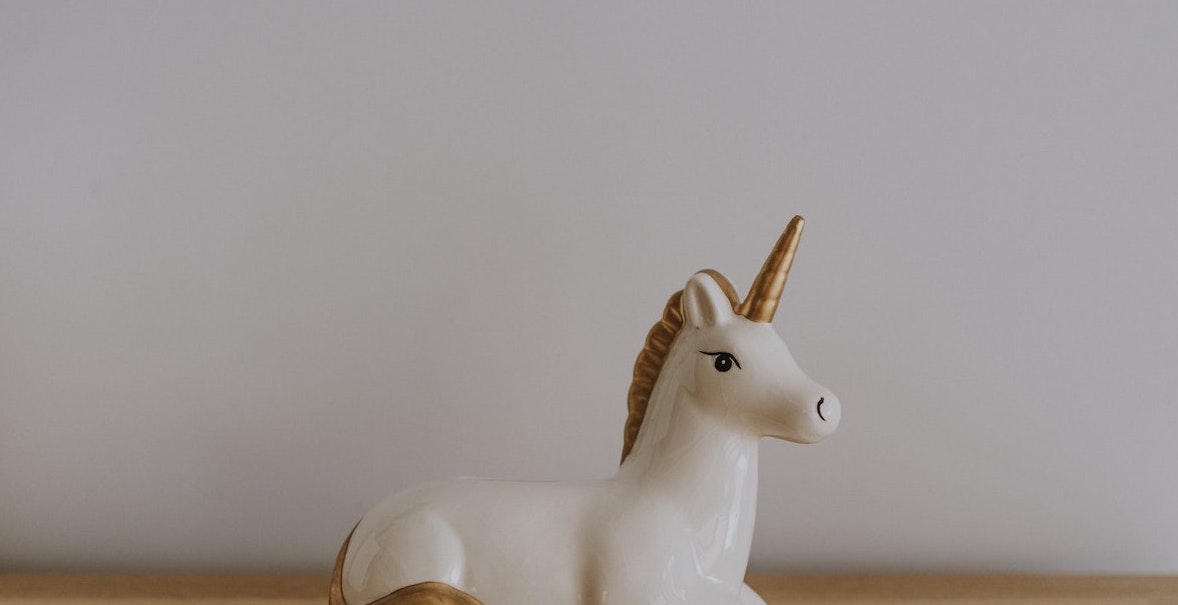 Photo of a small, unicorn figurine.