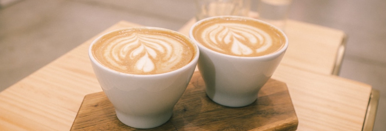 Two cups of coffee.