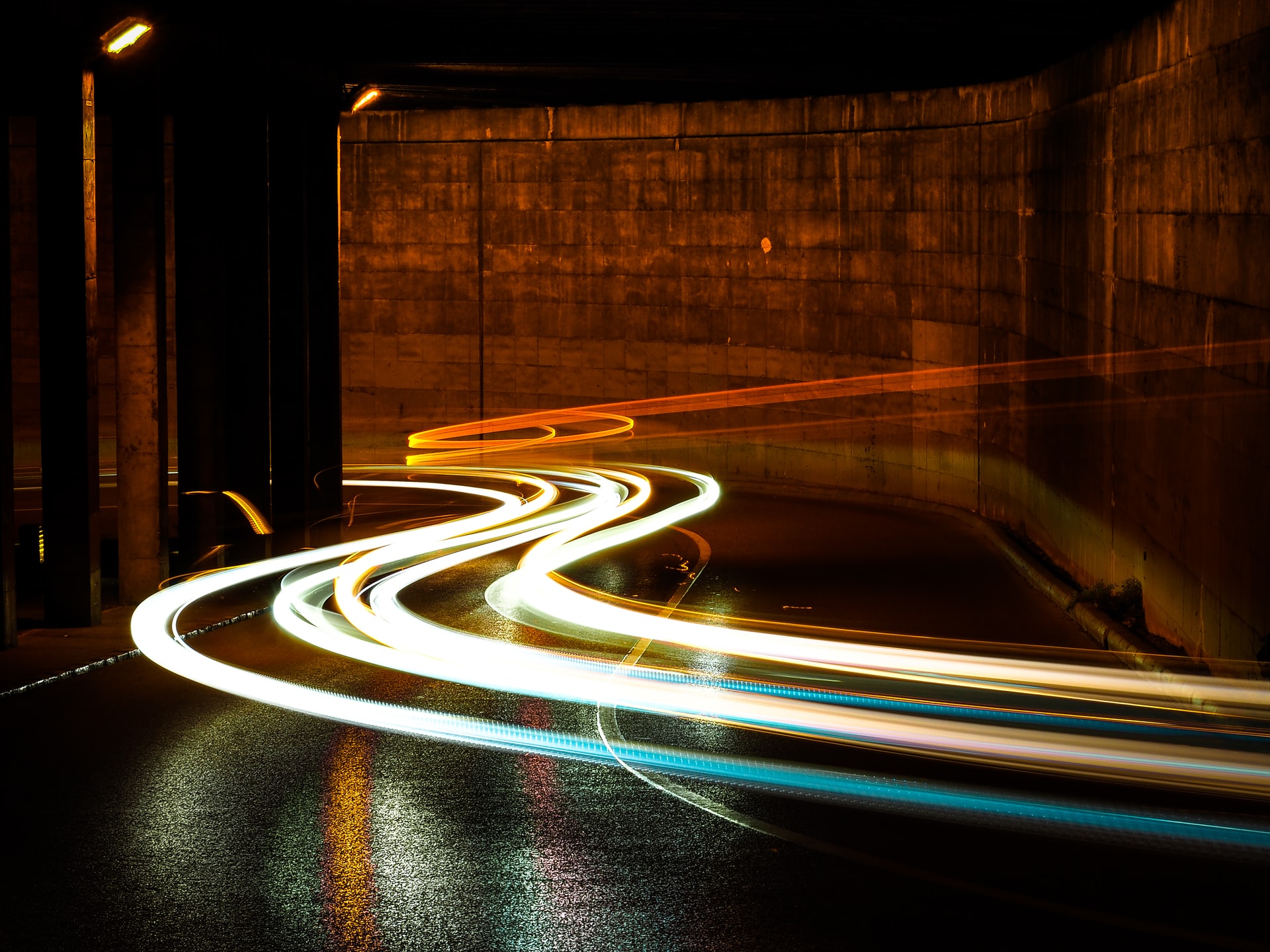 Automotive traffic at night filmed with very slow speed photography.